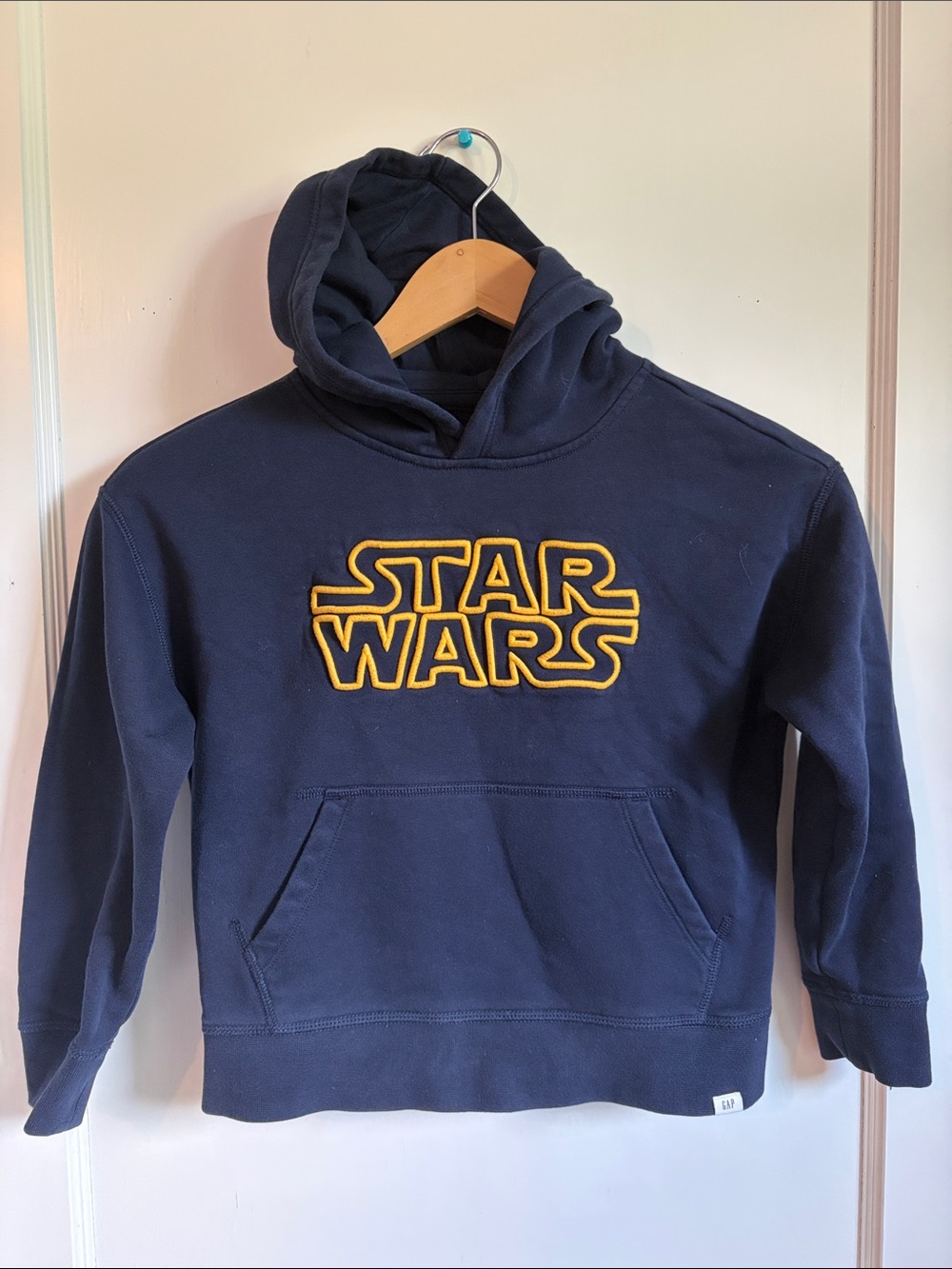 GAP Kids Navy Pullover Hoodie with Gold Star Wars Logo - size 6/7 Small